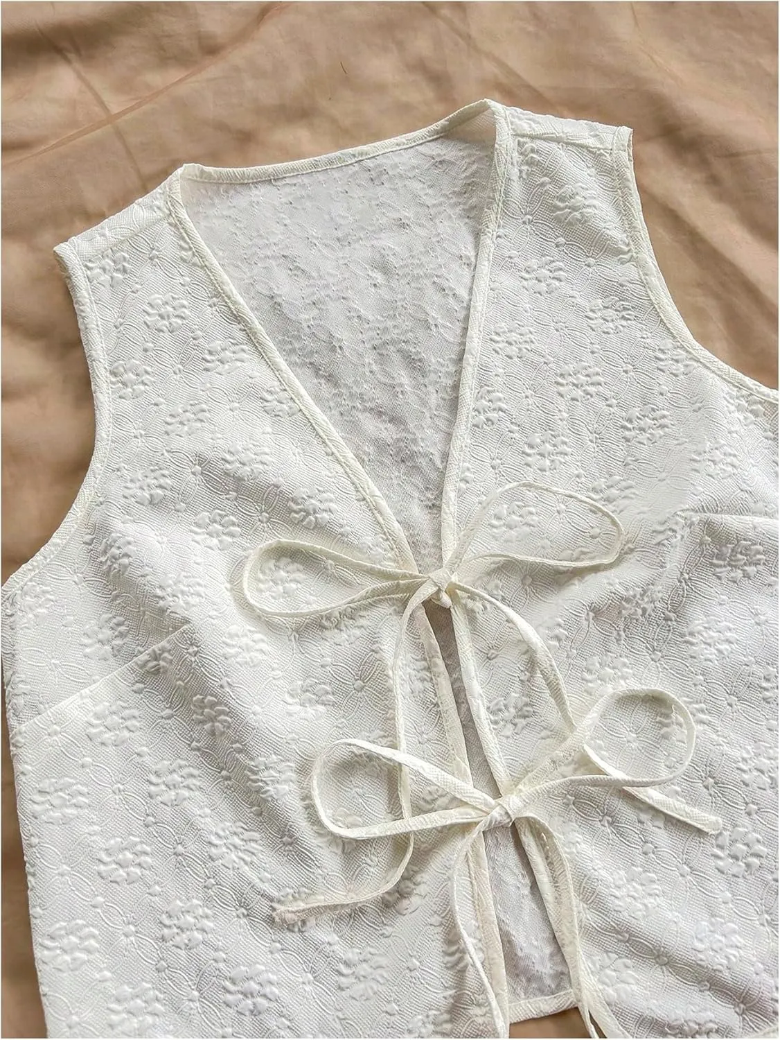 OYOANGLE Women's Textured Bow Tie Front Vest Sleeveless Cute Tops V Neck Summer Tank Tops