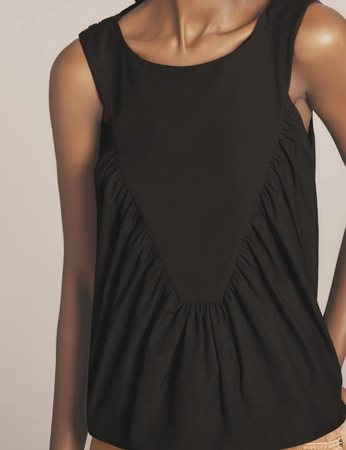 Shiyifa Womens Peplum Babydoll Tops Shirred Swing Tank Tops Pleated Flowy Loose Fit Ruffled Vests